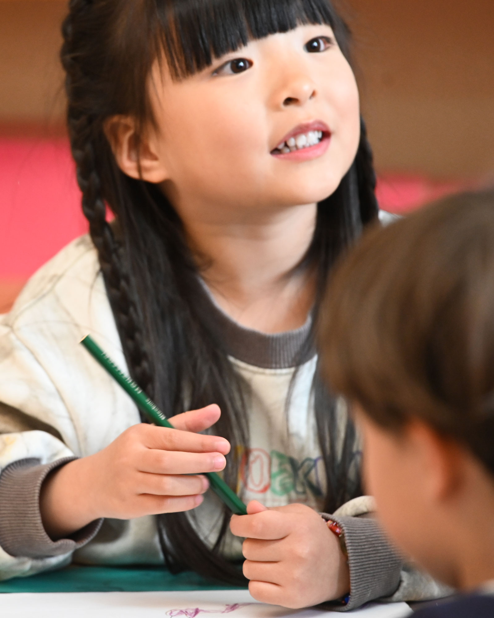 Chinese child in Montessori Kindergarten